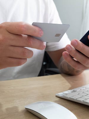 Man making online payment with smartphone